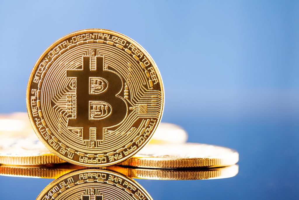 Bitcoin sobe, Coinbase cai